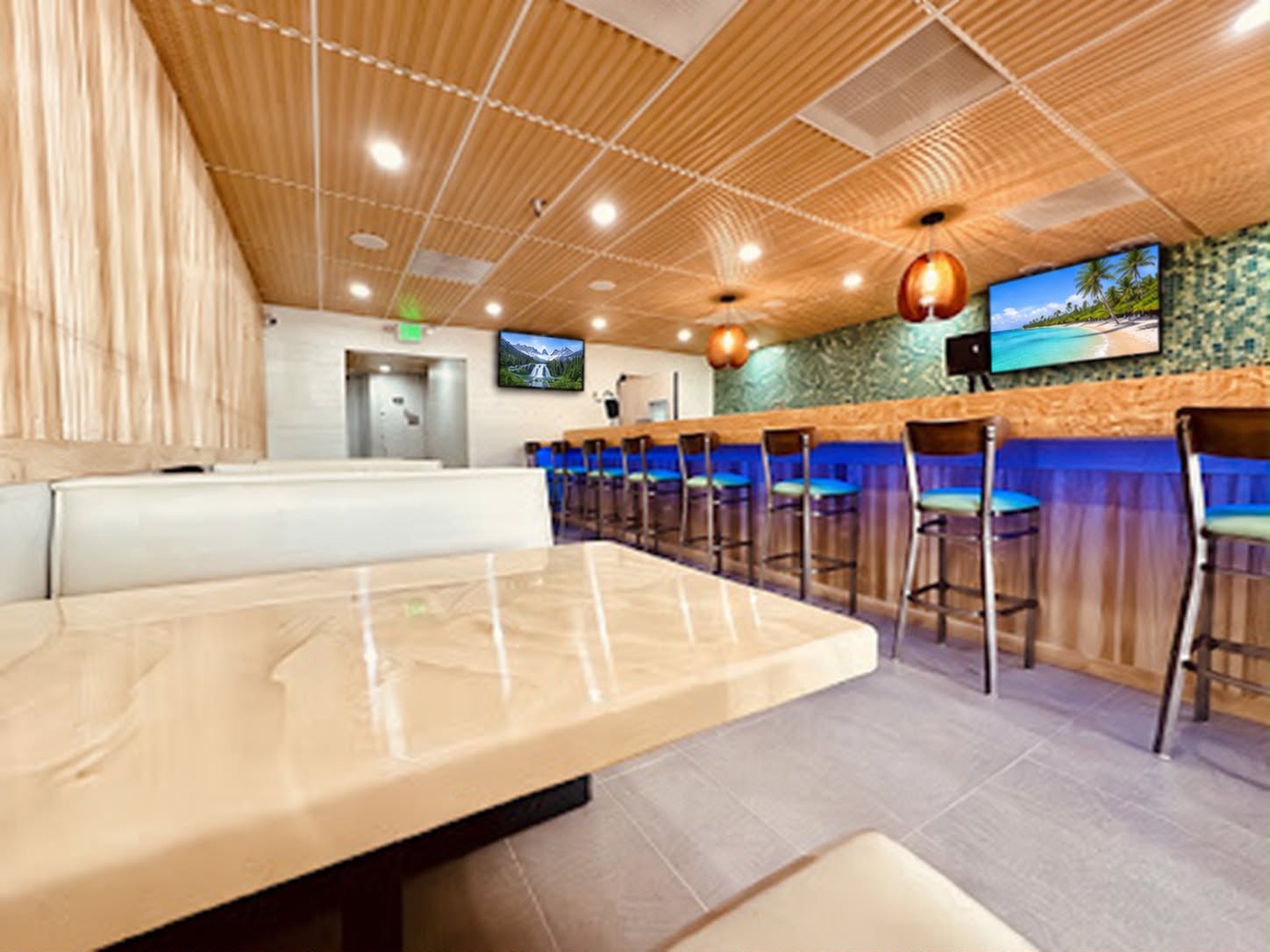 Interior featuring white booths paired with light wood vertical slat wall panels.