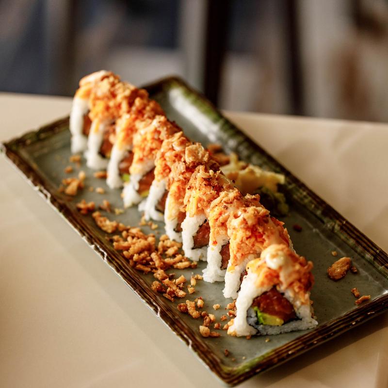Balagan Roll featuring a topping of tempura flakes.